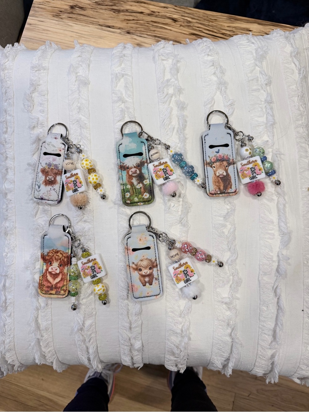 SOLD OUT. Southern Girl Highland Cow chapstick holder with beaded keychain.